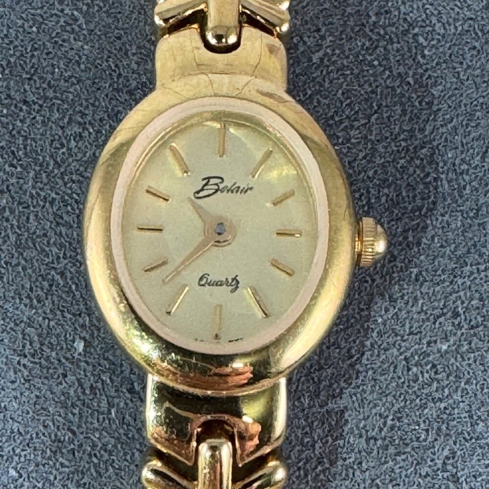 Vintage Belair Gold Tone Watch with Champagne face Raised Gold Markers and Hands